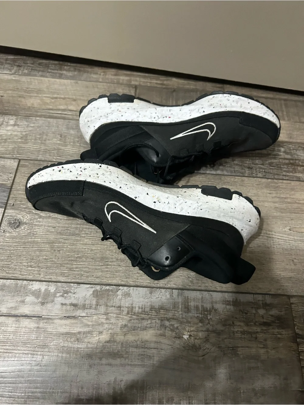 black and white Nike Crater Remixa sneakers speckled soles